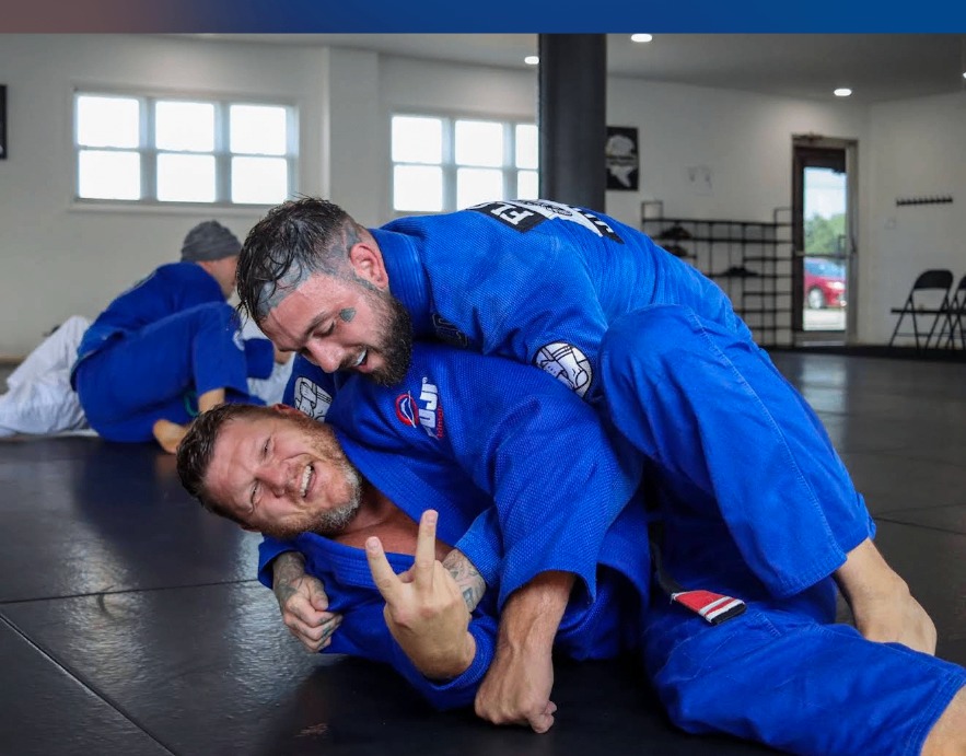 Adult students rolling at Empower Jiu Jitsu in Saxonburg, PA